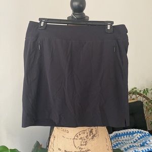 Athletha Skort with front zippered pockets SZ 8